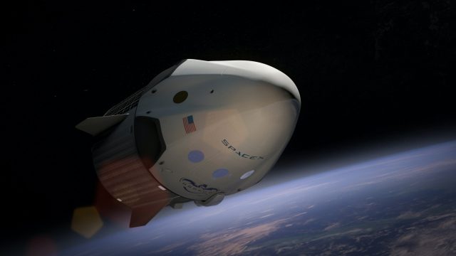 SpaceX space shuttle in orbit above earth